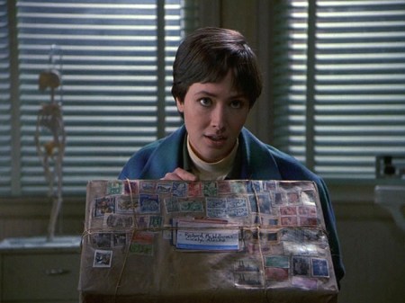 3-20-maggie-behind-package